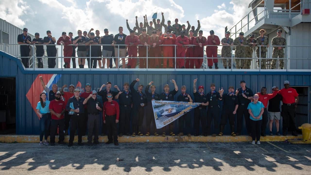 Celebratory photo of the USS Indiana team after winning gold